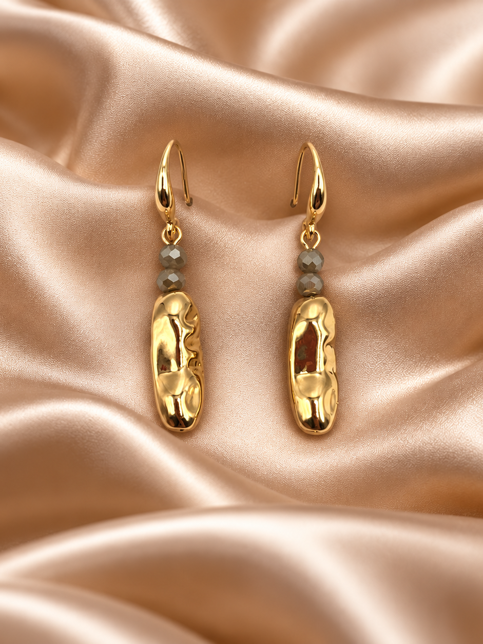Oorbellen met grijs/gouden steentjes